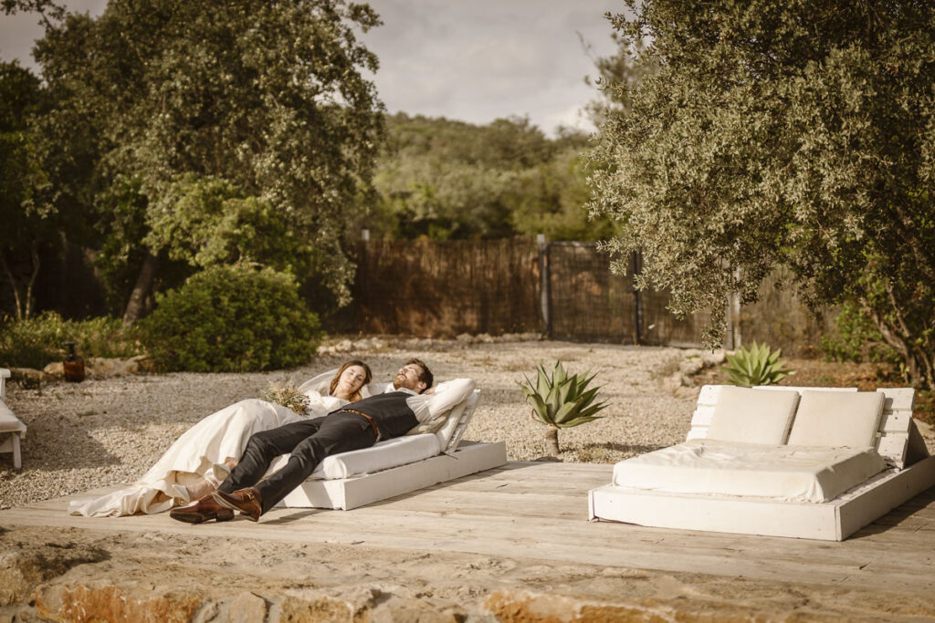 Bride and groom laying down in Loule, Portugal