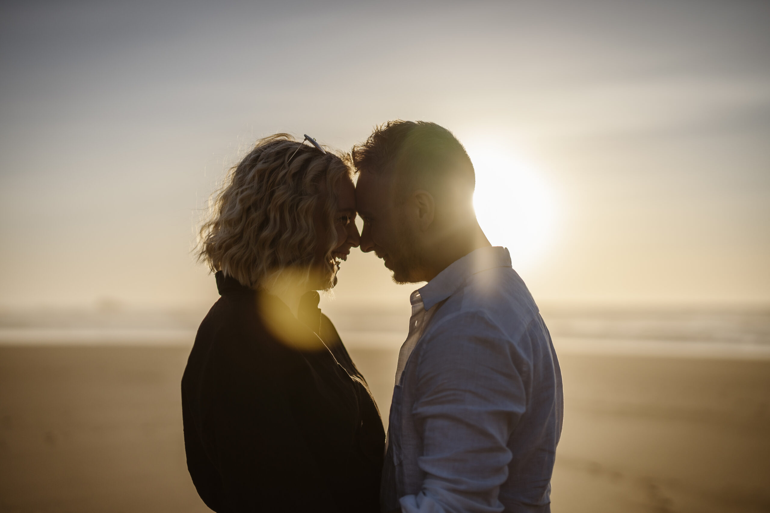 Happy couple in west coast of Algarve in Portugal.