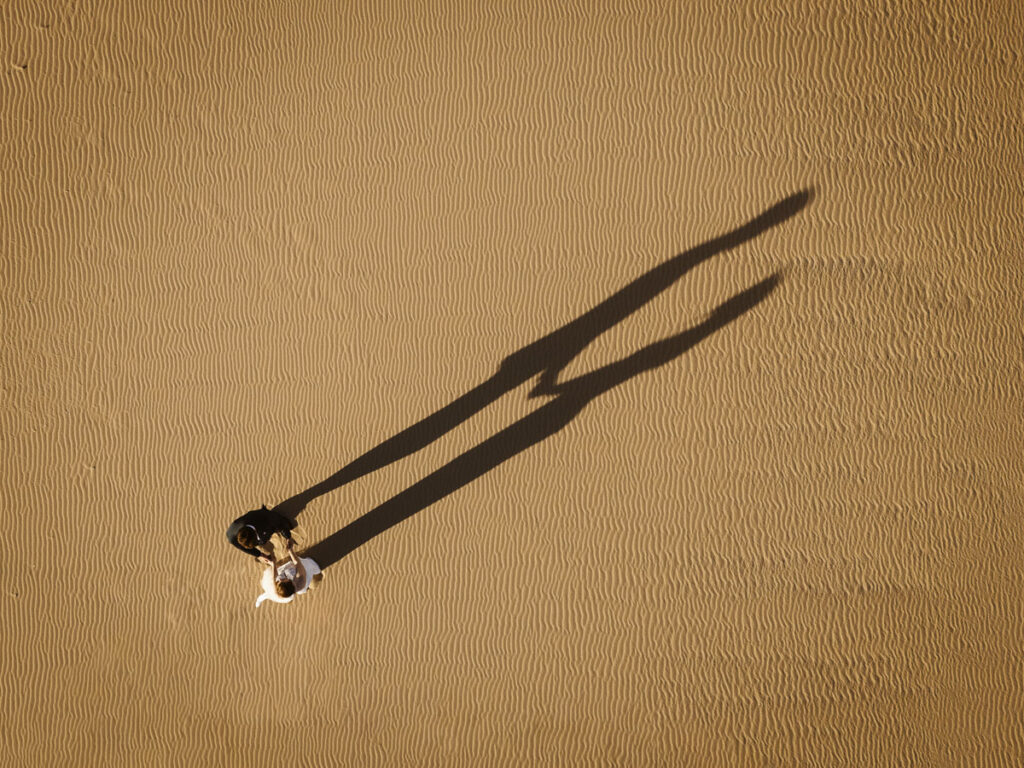 Bride and groom shadow in Bordeira, Portugal