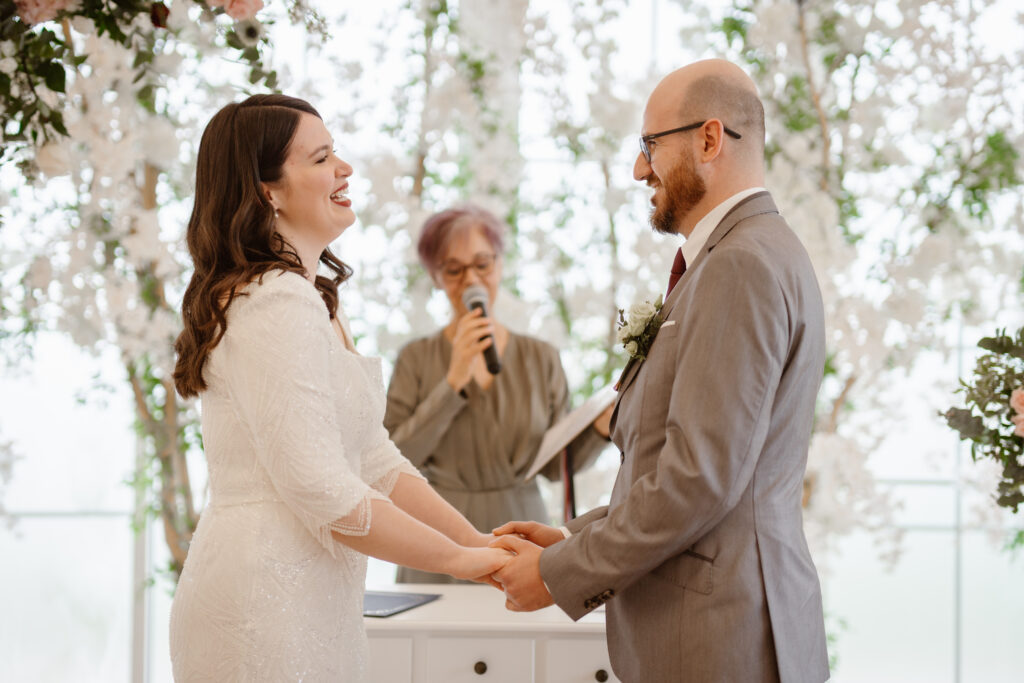 Margarida bride and Daniel groom before altar during the wedding day
