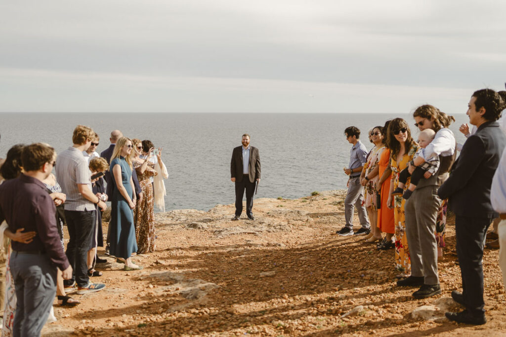 Shot of minister standing down the aisle in Alvor, Portugal