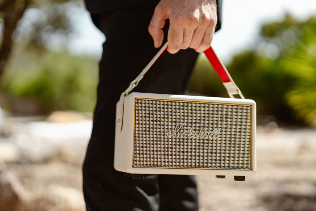 Man holding small amp in Loule, Portugal