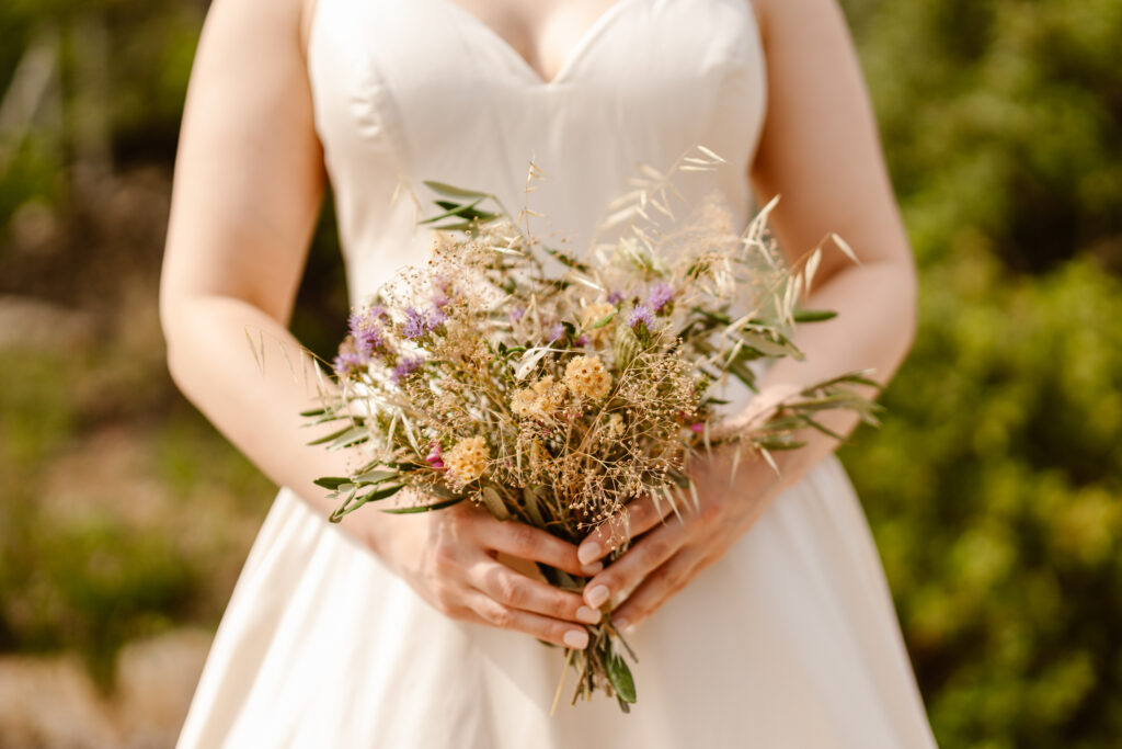 Bride holding bouquet in Loule, Portugal