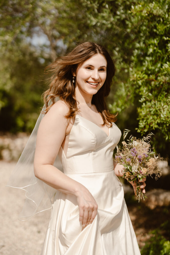 Bride holding bouquet in Loule, Portugal