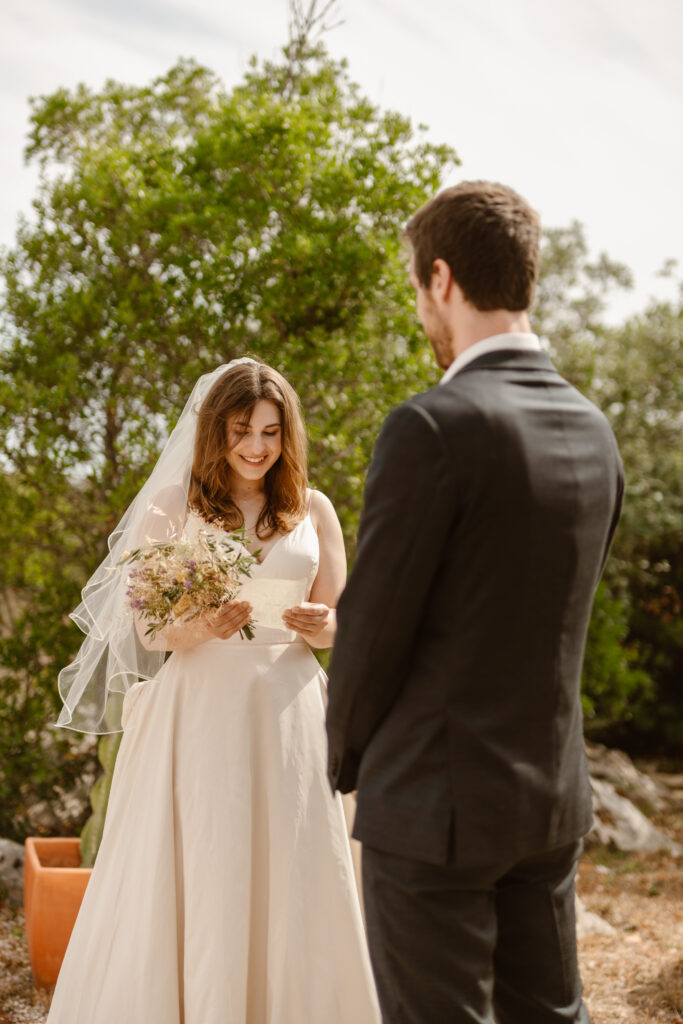 Bride reads vows to groom in Loule, Portugal