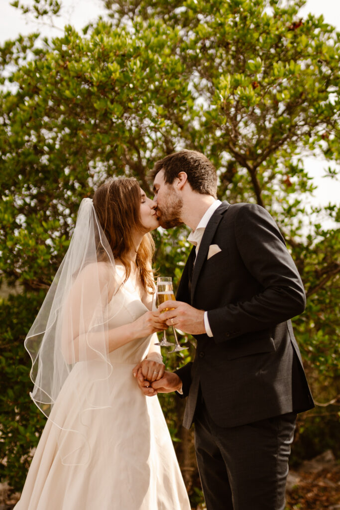 Bride and groom kiss in Loule, Portugal