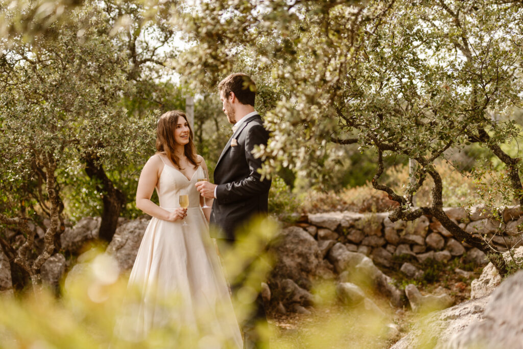 Bride and groom talk in Loule, Portugal