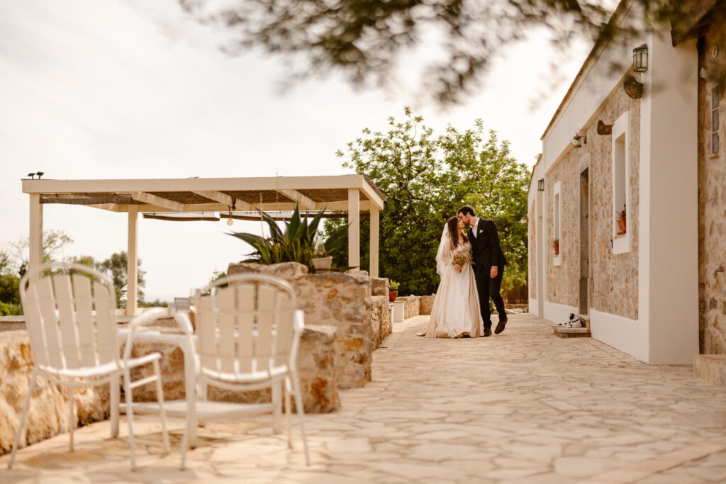 Bride and groom kiss in Loule, Portugal