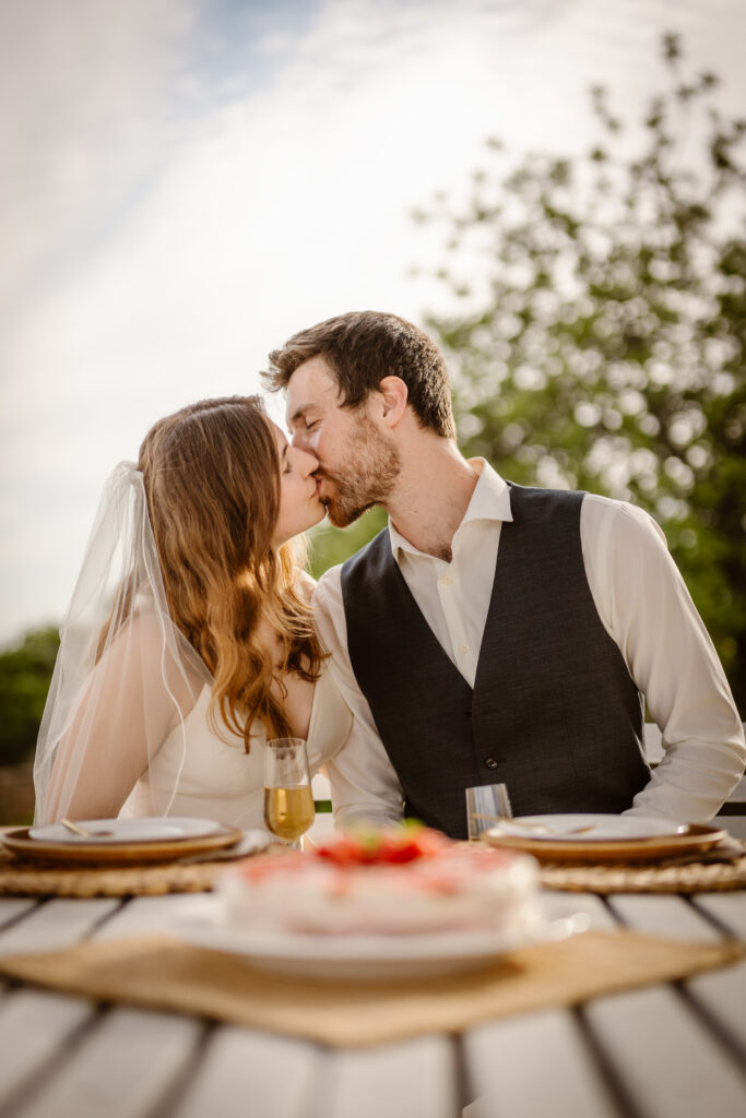 Bride and groom kiss in Loule, Portugal