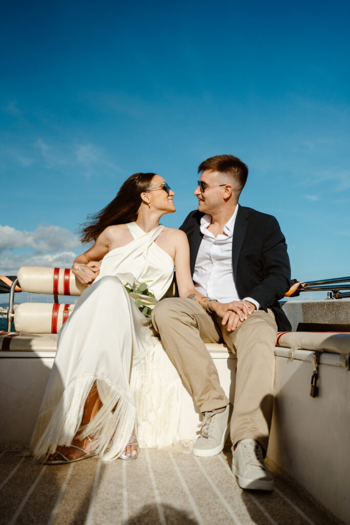Happy bride and groom looking at each other. Elopement in Algarve.