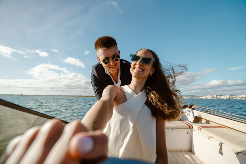 Bride and groom on the boat in Portugal.