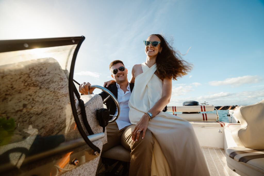 Bride and groom on the speedboat in Algarve.