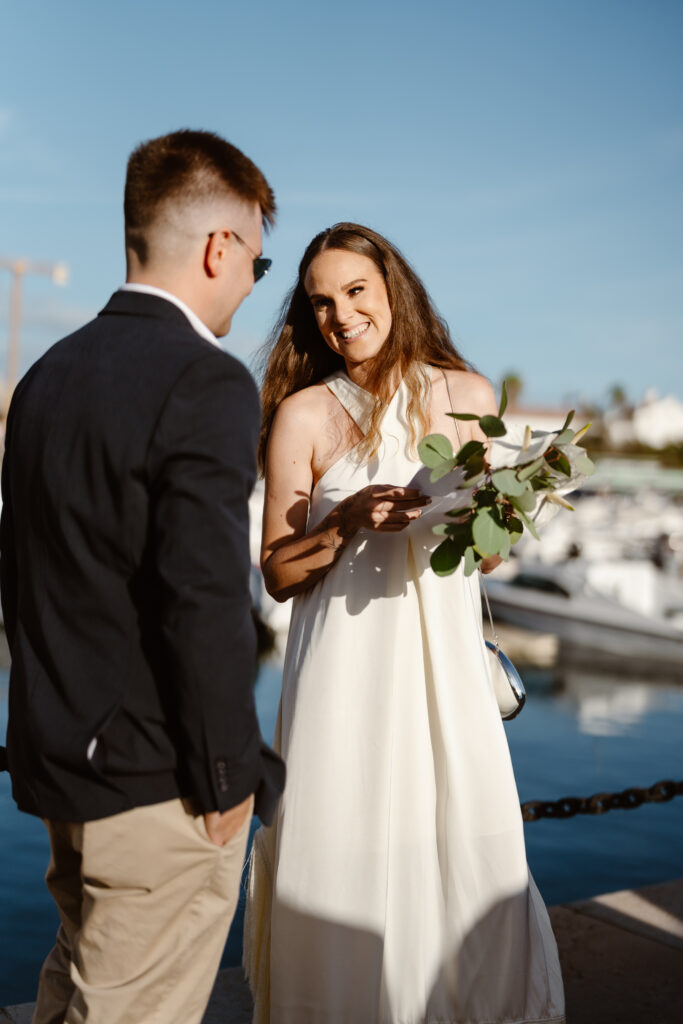 Bride and groom stare lovingly at one another in Algarve, Portugal