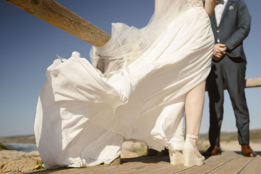 Brides dress during Elopement in Bordeira, Portugal