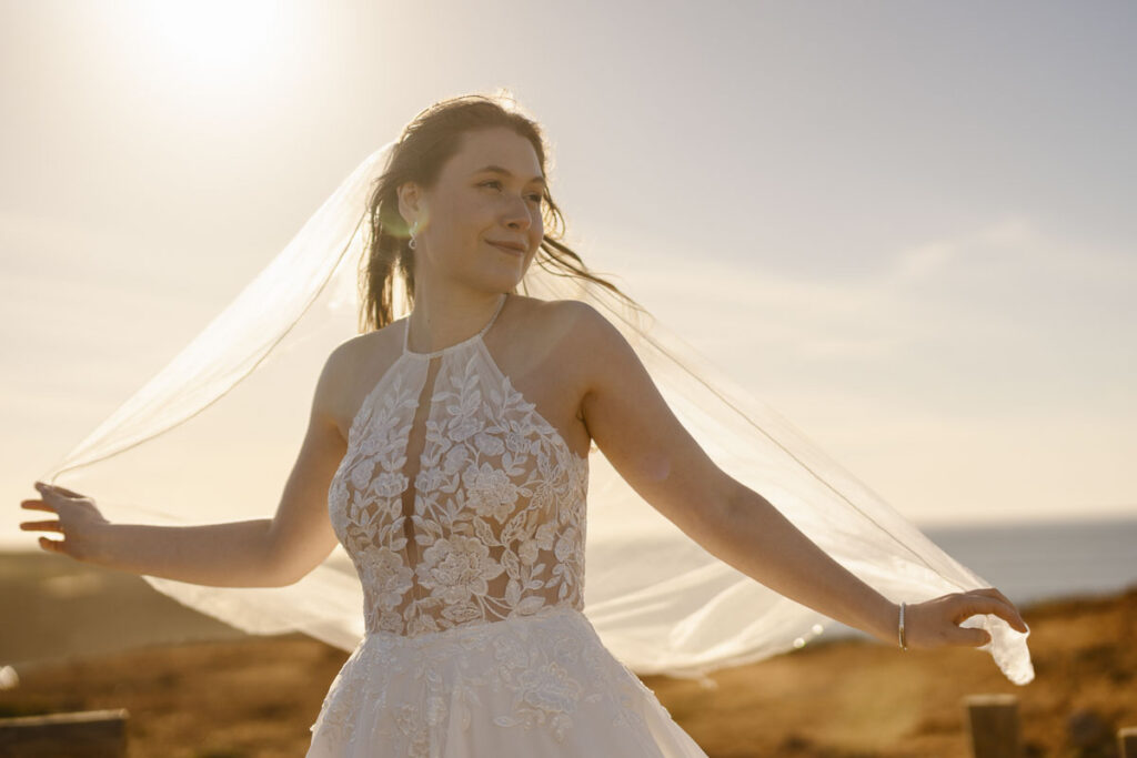 Bride with veil in Bordeira, Portugal
