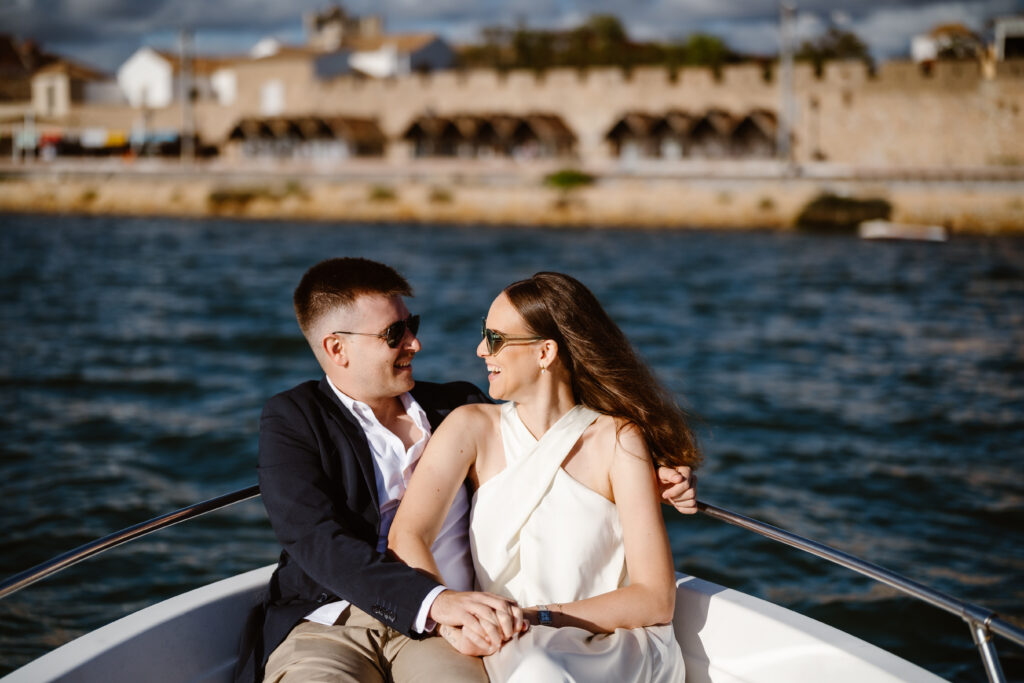Happy bride and groom on the boat in Portugal.