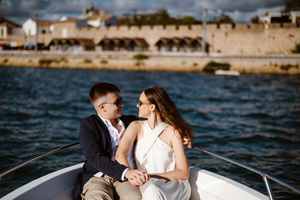 Romantic elopement bride and groom on the boat in Faro.