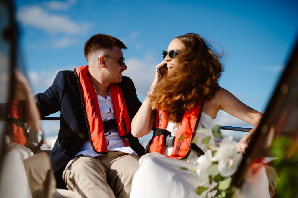 Wedding photo shoot on the boat. Elopement bride and groom.
