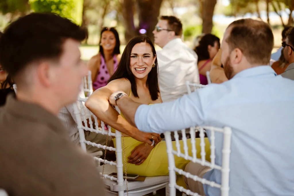 Smiling bridesmaid during destination wedding in Portugal