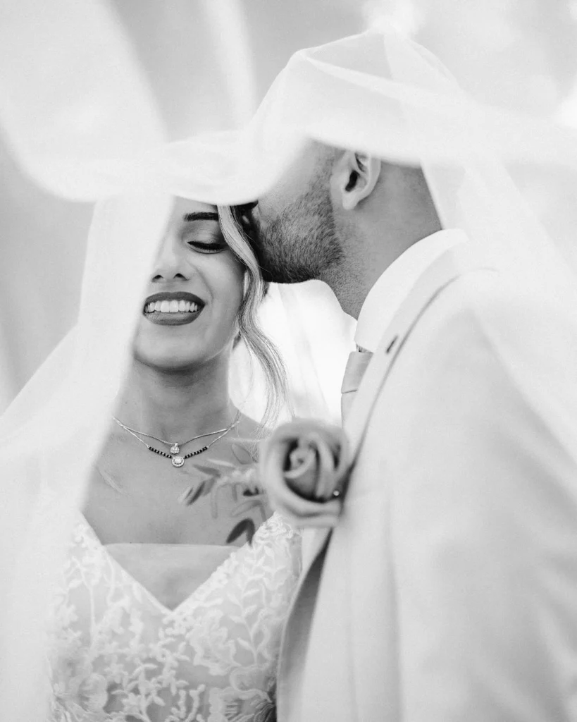 bride-and-groom-under-veil-romantic-portrait-algarve