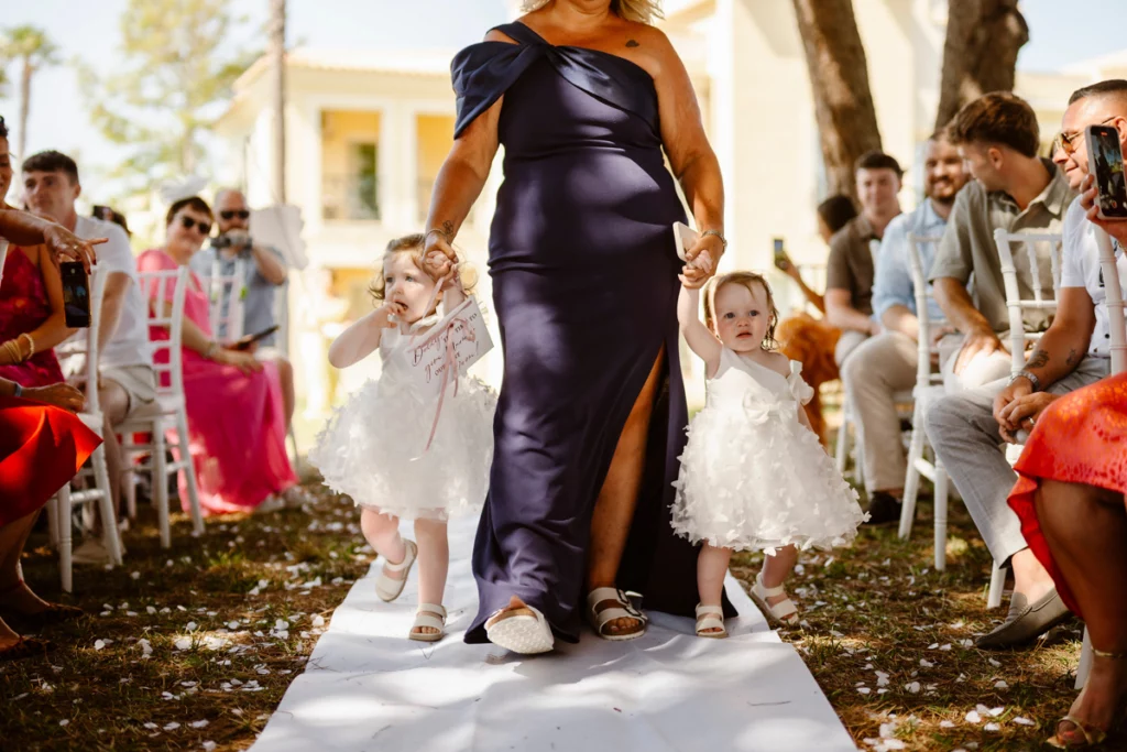 flower-girls-walking-down-the-aisle-algarve-outdoor-wedding