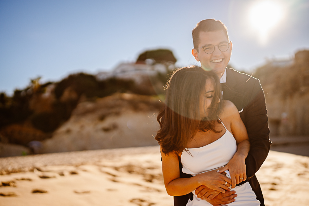 sunrise vs sunset engagement photos algarve couple on cliffs