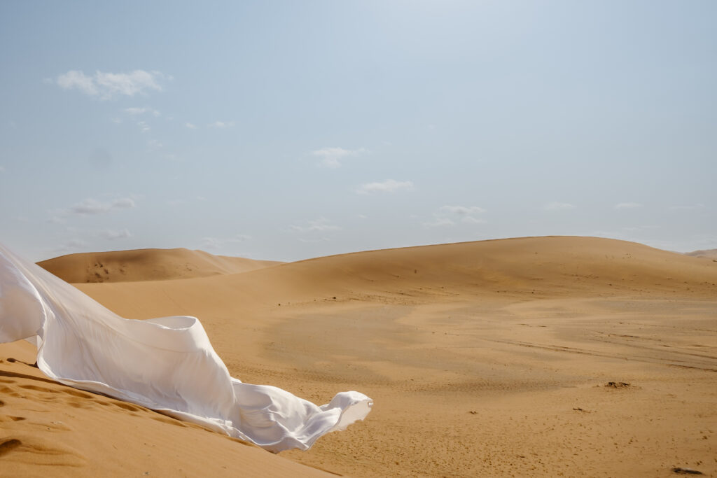 sand and flying dress