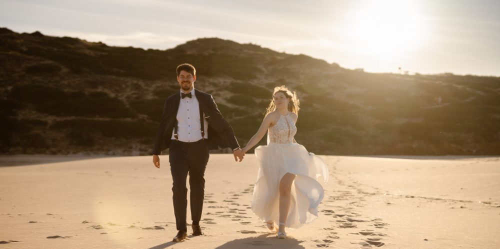 Couple walking on beach Couple walking on beach
